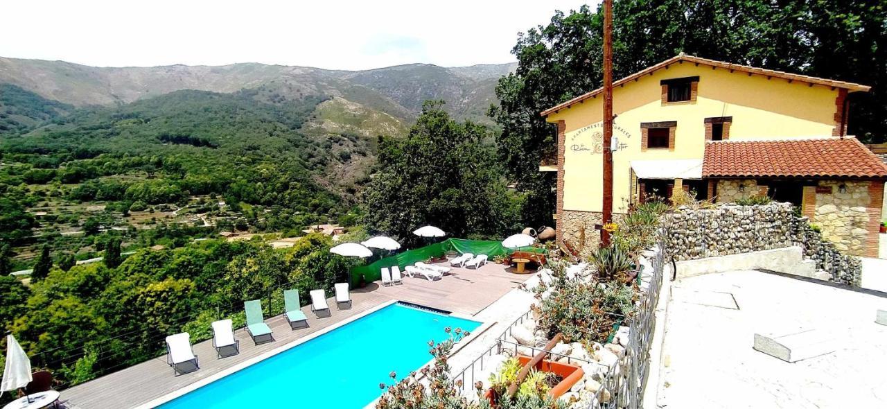 Apartamentos La Rosa Y El Pastor Guijo de Santa Bárbara Rom bilde