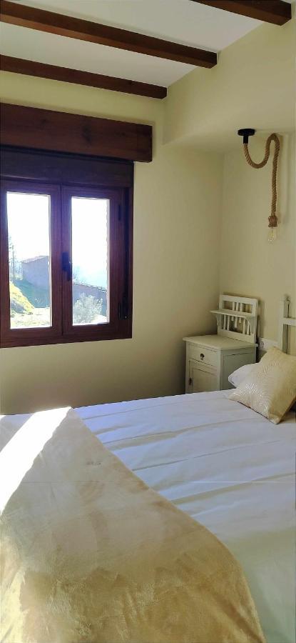 Apartamentos La Rosa Y El Pastor Guijo de Santa Bárbara Rom bilde