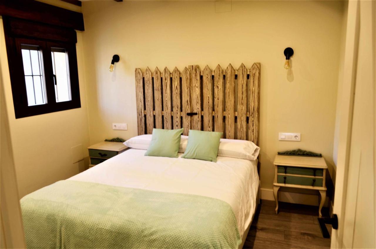 Apartamentos La Rosa Y El Pastor Guijo de Santa Bárbara Rom bilde