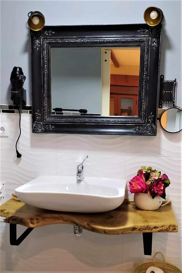 Apartamentos La Rosa Y El Pastor Guijo de Santa Bárbara Rom bilde